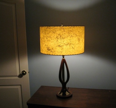 large drum lamp shade casting a shadow on the wall