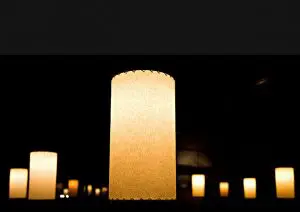 picture of glowing pendant drum lamps in midcentury modern style