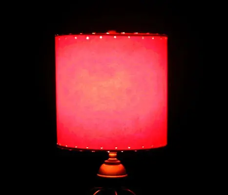 close-up of small red drum lampshade